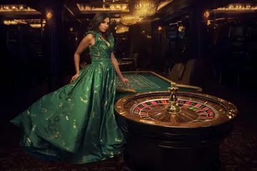 একজন পুরুষ তার ল্যাপটপে জয়ের মুহূর্ত উদযাপন করছেন, চারপাশে ভাসছে গেমিং আইকন—যা PARIPULSEE গেমসের উত্তেজনাকে প্রকাশ করে।